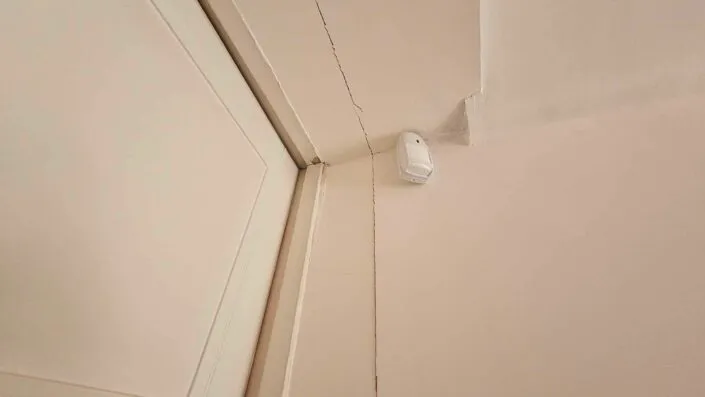 expertise fissure Allier verticale entre la maison principale et l'extension traversante Montluçon